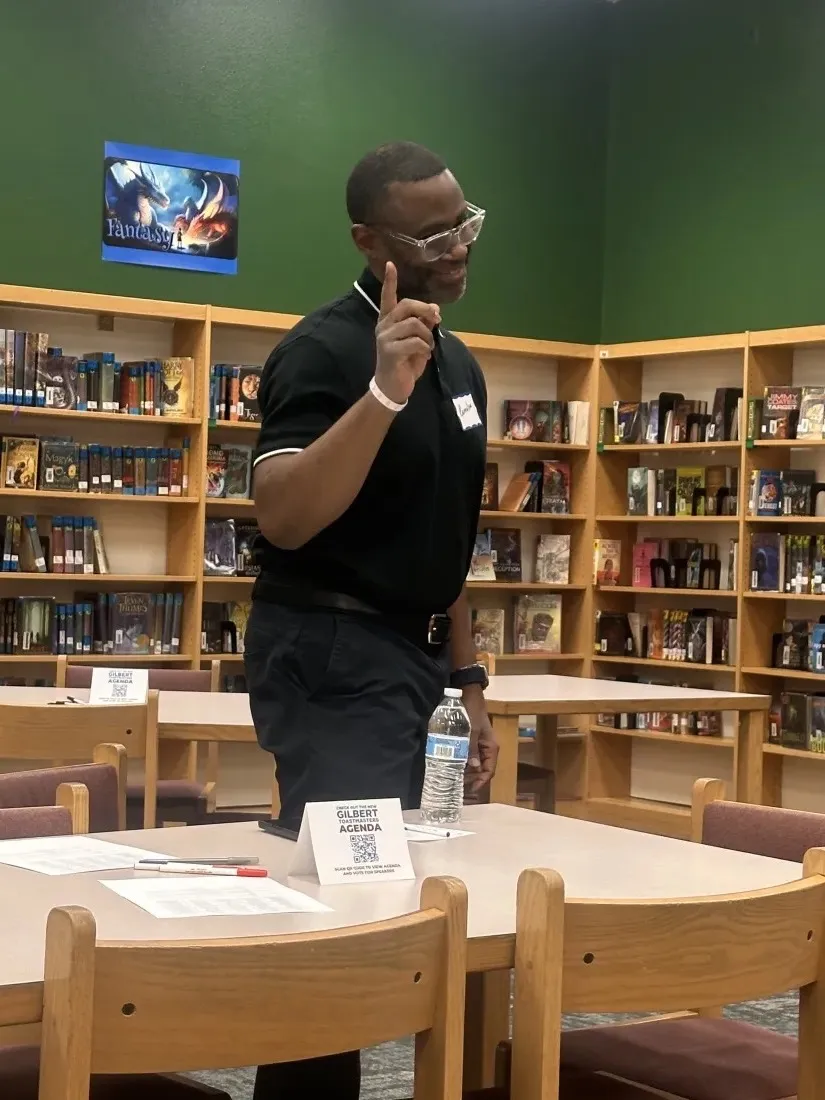 Cornelius, an enthusiastic guest, making a point during a Gilbert Toastmasters meeting